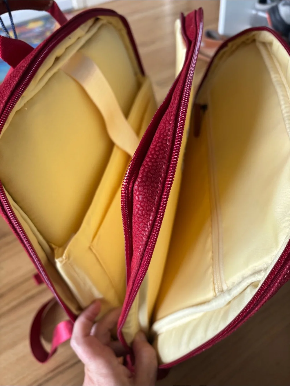 Bric's Red Pebbled Leather Backpack with Tan Accents